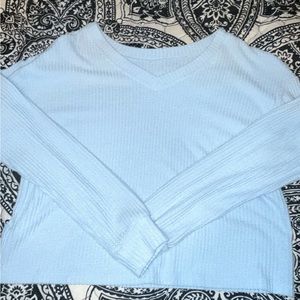 light blue sweater